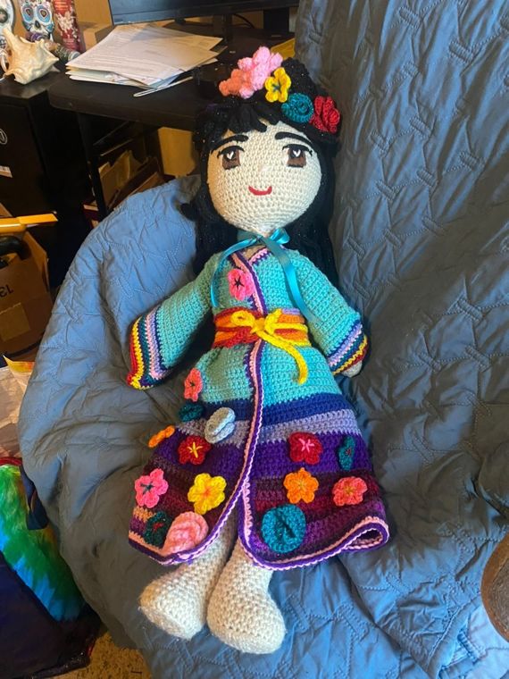Floral Kimono Doll: A tall doll in a teal kimono with a skirt of handmade flowers.