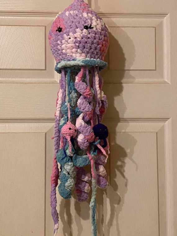 Lilac Jellyfish: A hanging jellyfish in lilac and teal with long curling tentacles.