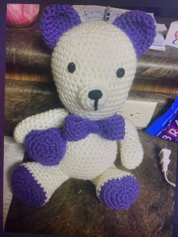 Violet Bow Bear: A huggable amigurumi bear in cream with violet ears, paws and bow tie.